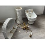 Ceramic sink and Bidet and gold taps