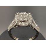 Ladies 9ct white gold Diamond ornate cluster ring. Approx .75ct 2.9g size K