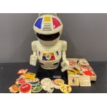 Vintage beer coasters in Gordon’s Gin and a toy Robot