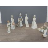 7 cascades figurines of ladys 2 clowns and dog with a ball