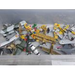 Box of miscellaneous plastic and metal military related model aircraft including a harrier jet by
