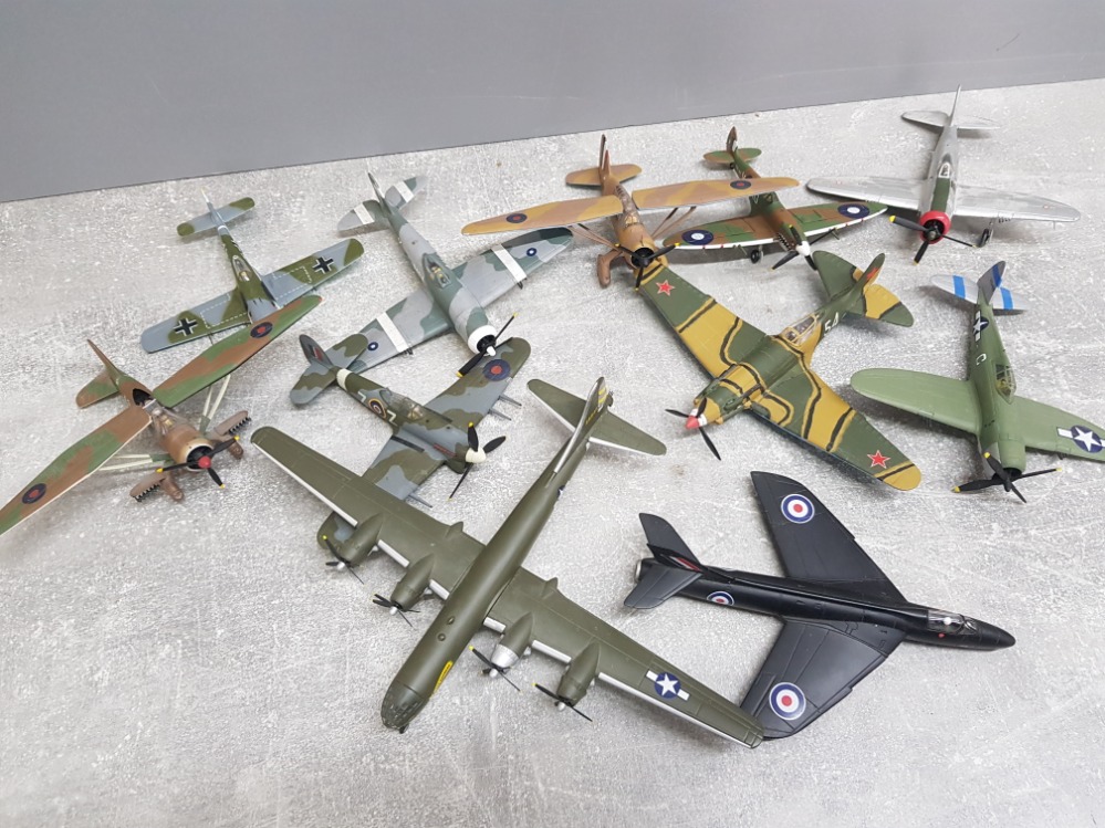 A total of 11 diecast model planes by Corgi includes the Boeing B29, p47 Thunderbolt, spitfire etc
