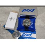 Pod digital wristwatch together with a Longboard stories Atlas for men watch both with original