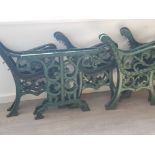 A total of 4 cast iron bench ends and 1 pair of table ends, vintage and painted in the standard