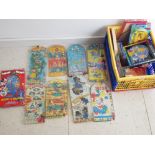 Crate containing a large Quantity of vintage novelty pinball games, includes Paddington bear, Tom