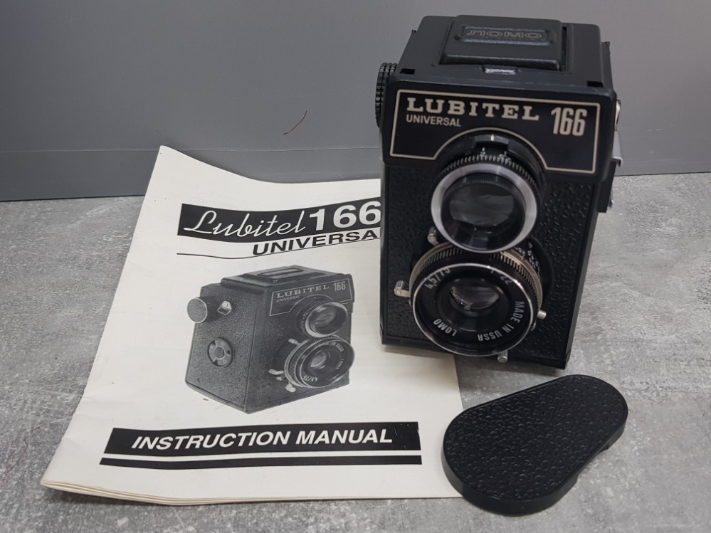 Vintage Lubitel 166 universal TLR 120 medium format film camera with original instruction booklet