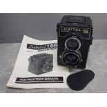 Vintage Lubitel 166 universal TLR 120 medium format film camera with original instruction booklet