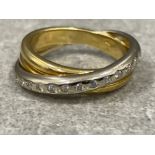 18ct white and yellow gold Diamond crossover ring. Size O 9.13g