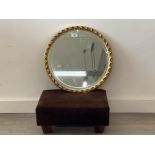 Round gold framed Mirror and brown footstool