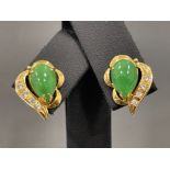 Ladies 14ct gold Green and white stone studs. Featuring 2 pear shaped green stone.