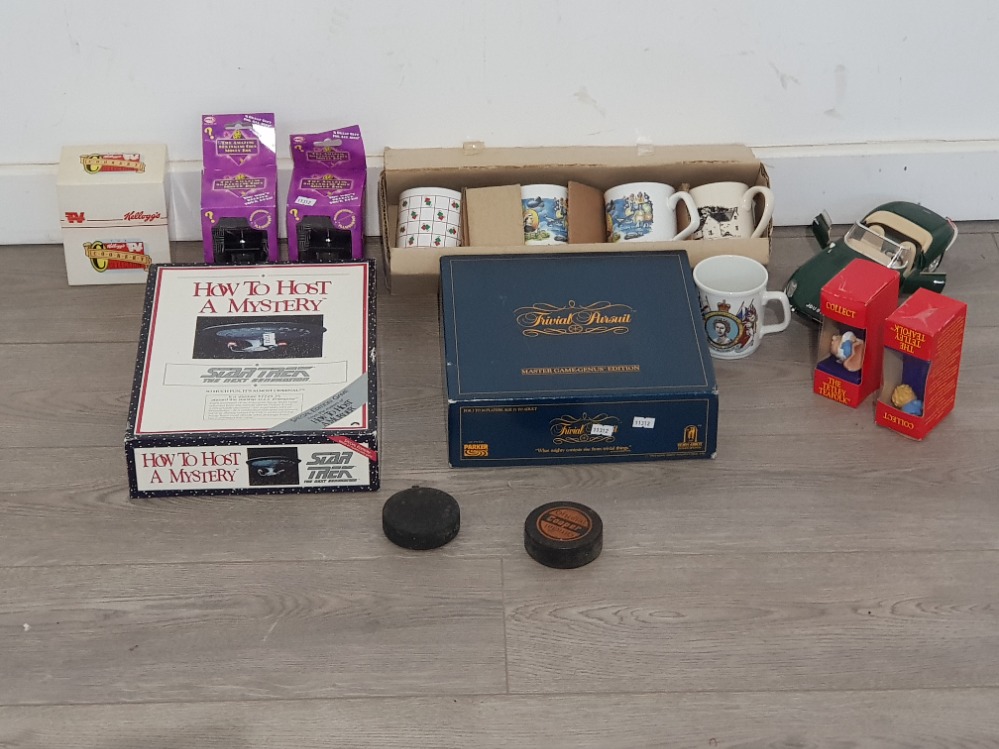 2 boxed limited edition games ,startrek how to host a mystery game along with trivial pursuit master