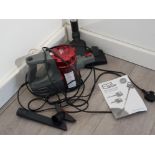 EGL 600w hand held vacuum cleaner, with attachments and instructions