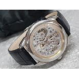 Automatic City time stainless steel skeleton wristwatch with black leather straps and original box