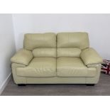 Cream leather 2 seater sofa. Great condition