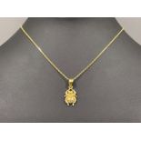 18ct gold “Scarab” pendant and chain. Good condition 6.6g