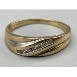 Gents 9ct gold and diamond ring. Featuring 7 round brilliant cut diamonds set across the ring.