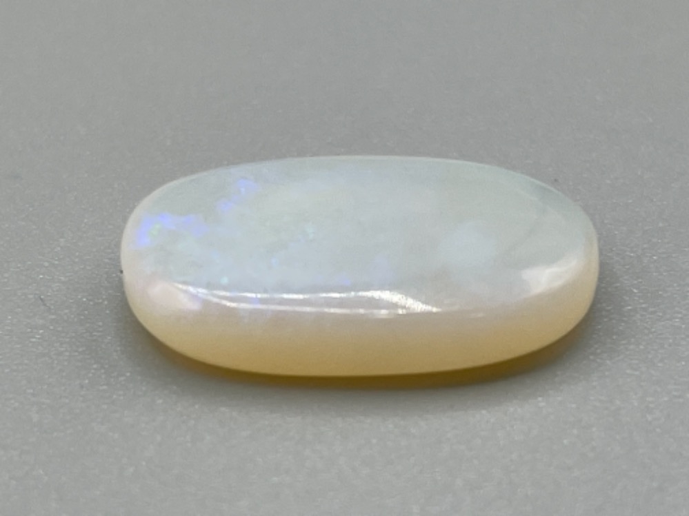 5.95ct Natural Opal oval cabochon gemstone with certificate - Bild 2 aus 2