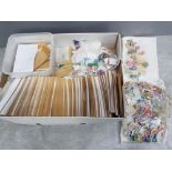 Box of mixed loose stamps, hundreds of envelopes each containing duplicates of stamps from around