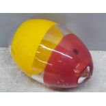 Large 8½" clear glass with red and yellow egg designed by Bjorn Ronnquist