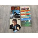 Collection of records including John Lennon, Cliff Richard’s and the Beach boys