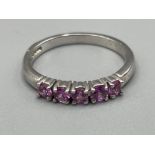Ladies 18ct white gold Pink sapphire ring. Comprising of 5 round pink sapphires all claw set. 2.