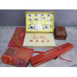 Selection of oriental style items including minature dolls tea set, carved musical jewellery box,