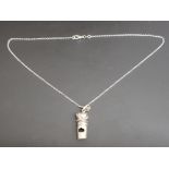 Silver whistle in the form of a fist holding a snake on silver chain, 12.2g