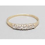 9ct yellow gold 5 CZ stone ring, size Q, 1g gross