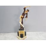 Tall 16" and very heavy art deco figurine of a lady dancing, set on marble base, damaged leg with