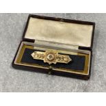 9ct gold Bar brooch set with old cut diamond in centre