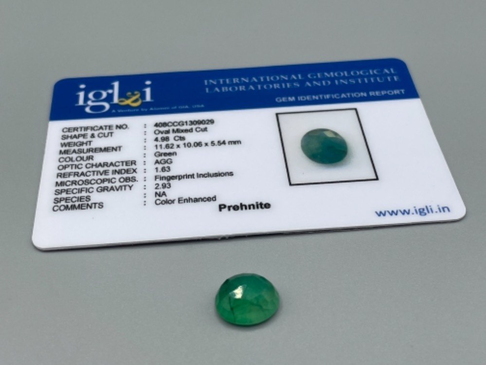 4.98ct oval cut green gemstone with certificate