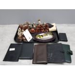 Tray lot containing a selection of wax monk musician band miniatures also includes leather purses