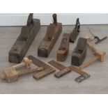 5 vintage wood planes together with mallets, clamps and three wood square's