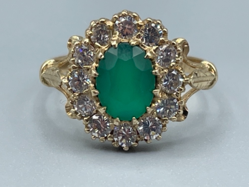 Ladies 9ct gold Green stone and CZ Cluster ring. 3.08g Size O1/2