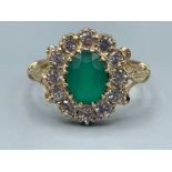 Ladies 9ct gold Green stone and CZ Cluster ring. 3.08g Size O1/2