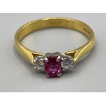 Ladies 18ct gold Ruby and diamond ring. Featuring a oval ruby set with a single round brilliant