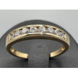 Ladies 9ct gold 8 stone band. Comprising of CZs size P 2.21g
