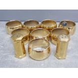 Danish 24 karat gold plated salt and pepper shakers and 8 napkin rings by Altecco