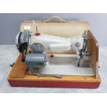 Vintage Jones sewing machine with original carrycase