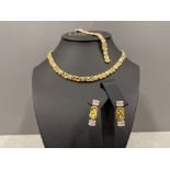 Designer 18ct gold and Diamond “Chiampesan” jewellery suite. Comprising of Necklace, Earrings and