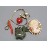 Foreign silver oval cameo brooch, 2 coral pendants and jade duck pendant