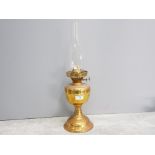 Antique brass and copper oil lamp