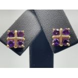 Ladies 9ct gold Amethyst square stud earrings. Featuring 4 round amethyst stones complete with