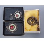 Austrian silver and Garnet pendant and Austrian petit point decorated brooch and pendant