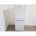 A Beko fridge freezer cxfg1552w