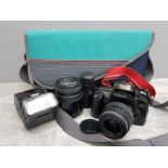 Cannon EOS 1000F camera, comes with carrybag, flash, spare lens etc p