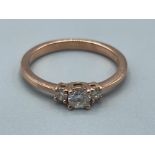 Ladies 9ct Rose gold 3 stone Diamond ring. Featuring a round brilliant cut diamonds set with 2