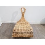 A Gullholmen banana fibre rocking chair of unusual design.