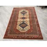 Large wool rug in good condition. 140cm x 200cms