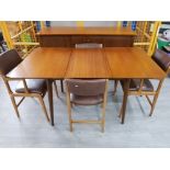 Teak dining room suite includes a Teak sideboard by Robson and sons plus matching extending table